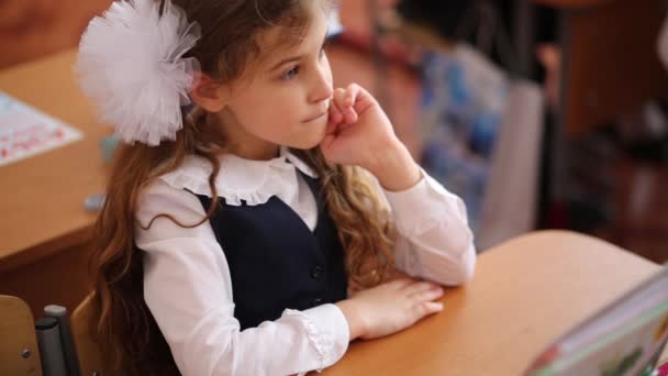 Serious schoolgirl in uniform — Stock Video