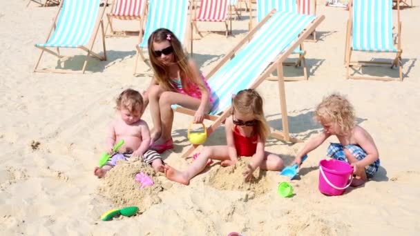 Children  play on sand. — Stock Video