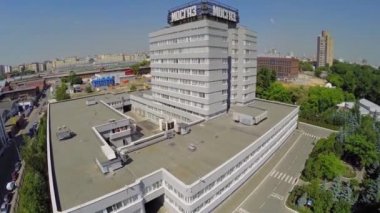 Headquarters of Mosgaz company against cityscape at summer