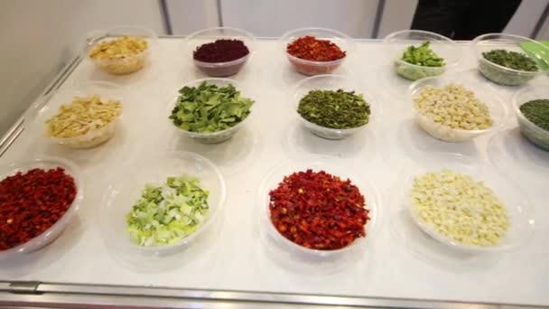 Samples of food at International Exhibition of Food Ingredients — Stock Video