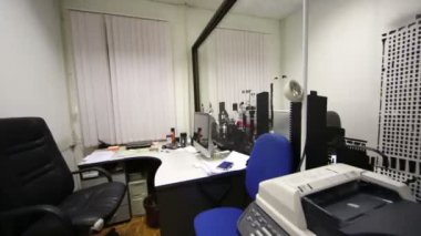 Working place in office, equipped with modern furniture
