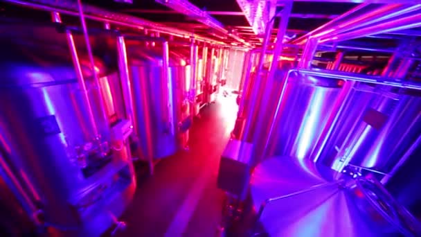 Steel tanks at brewery under constantly changing lighting — Stock Video