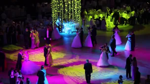 Waltzing people in colored lights at 11th Viennese Ball — Stock Video