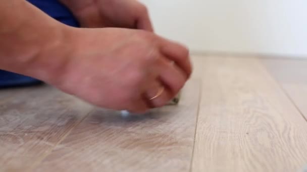 Hands put together furniture fittings — Stock Video