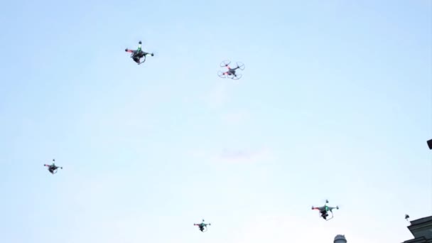 Four quadrocopters fly — Stock Video