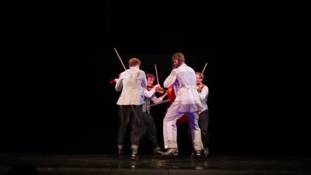 Violinists quartet play music and dance — Stock Video