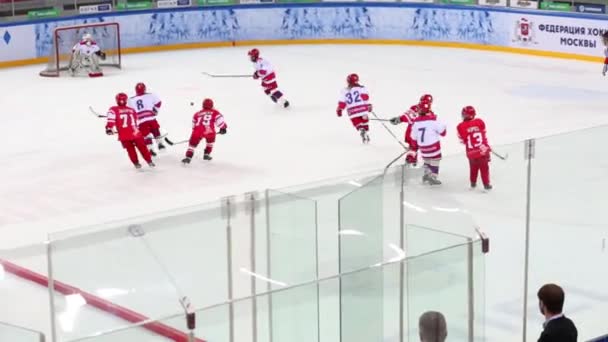 Game between children hockey teams — Stock Video