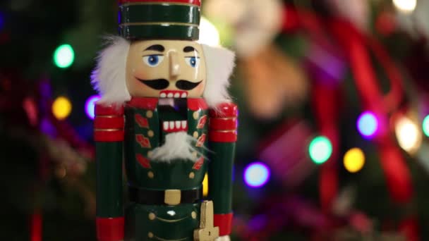 Toy Nutcracker, fir branches — Stock Video