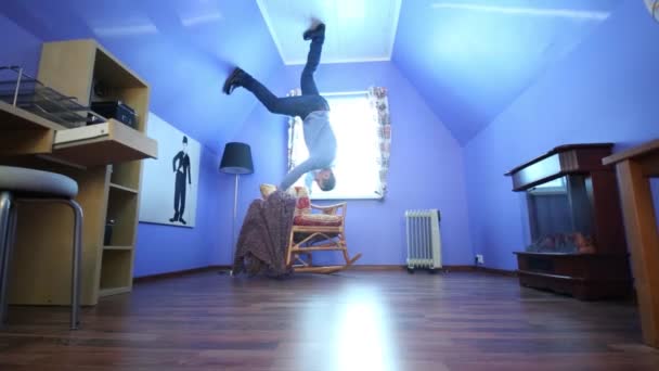 Man on ceiling in inverted house — Stock Video