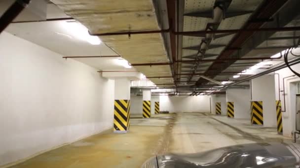 Movement of car in underground parking — Stock Video