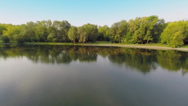 Teenager fishing on inflatable boat — Stock Video