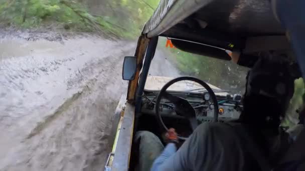 Two sportsmen ride in truck — Stock Video