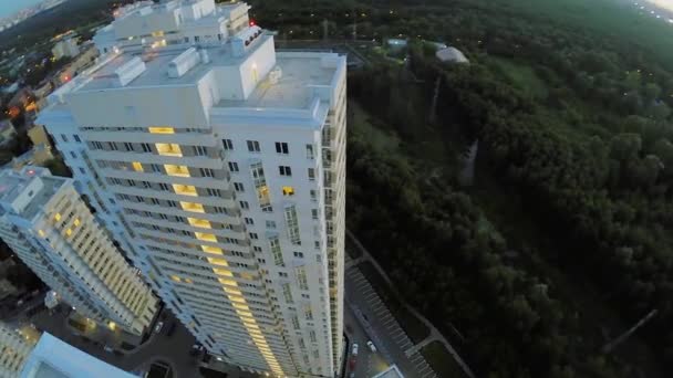 Residential complex with illumination at summer evening. — Stock Video