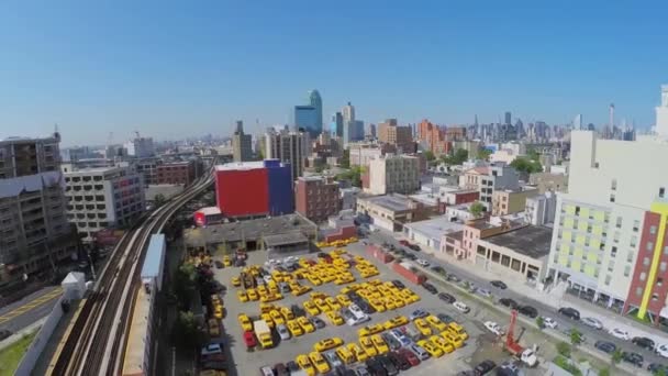 Cityscape with car parking near railway — Stock Video