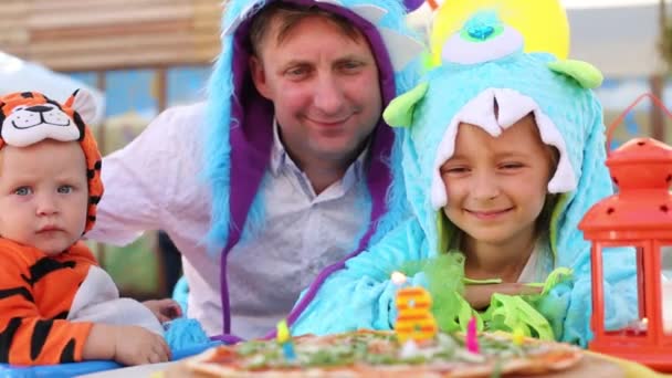 Father with daughter in monsters costumes — Stock Video