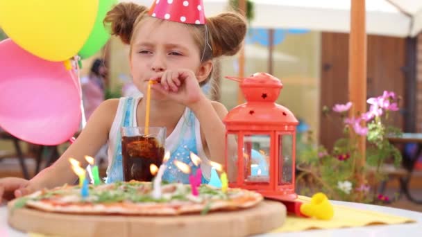 Pretty girl with pizza with candles — Stock Video