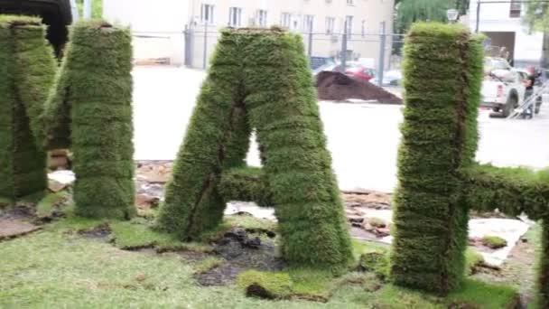 Large grassy letters with Bauman inscription — Stock Video