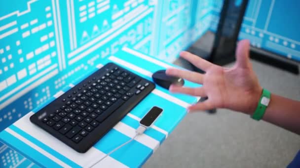 Hand of boy controlling computer — Stock Video