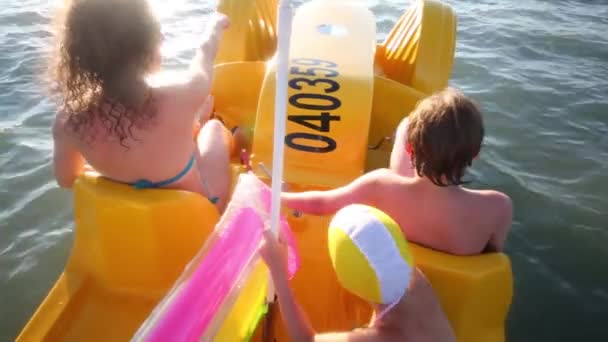 Mother with children ride on catamaran — Stock Video