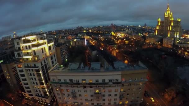 Cityscape with illumination at winter cloudy evening — Stock Video