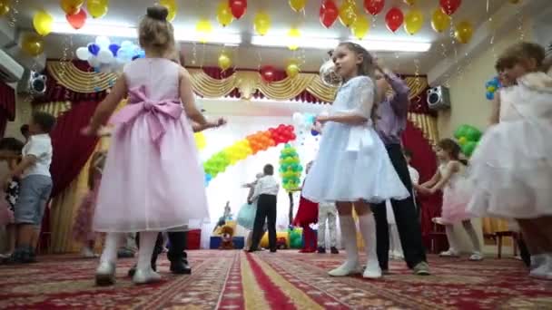 Children dance in pairs in kindergarten — Stock Video