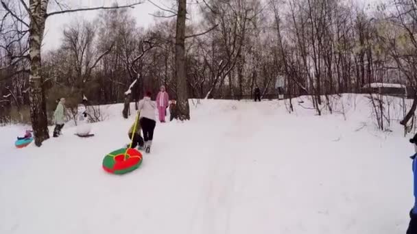 Woman with little boy ride — Stock Video