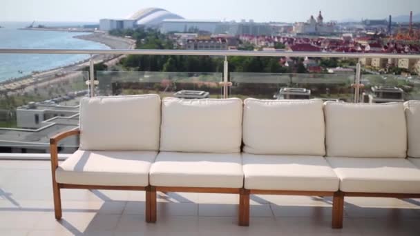 Beige sofas on rooftop — Stock Video