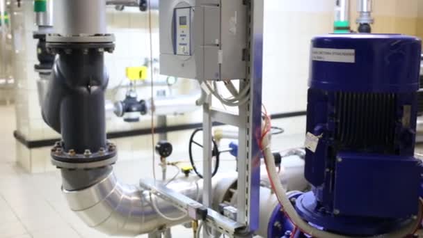Pipes and devices for heating supply for residential complex — Stock Footage Pipes and devices for heating supply for residential complex Royalty Free Stock Video