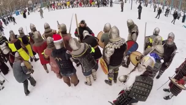 People in armour with shields and swords — Stock Video