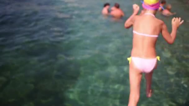 Girl jumping to water in Yalta, Ukraine. — Stock Video