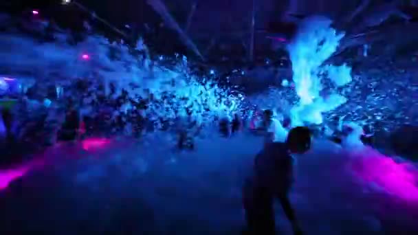 People dancing on foam party — Stock Video