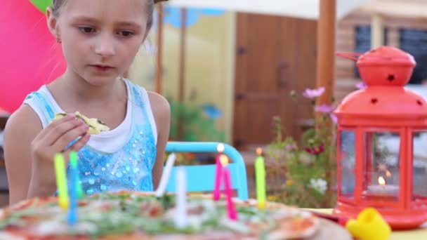 Little girl blowing out candles — Stock Video