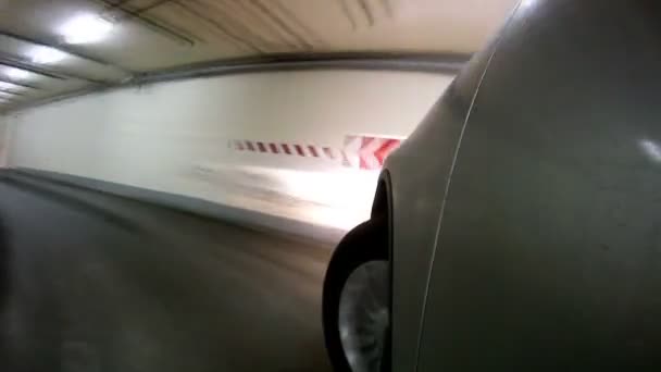 Car leaves underground garage — Stock Video