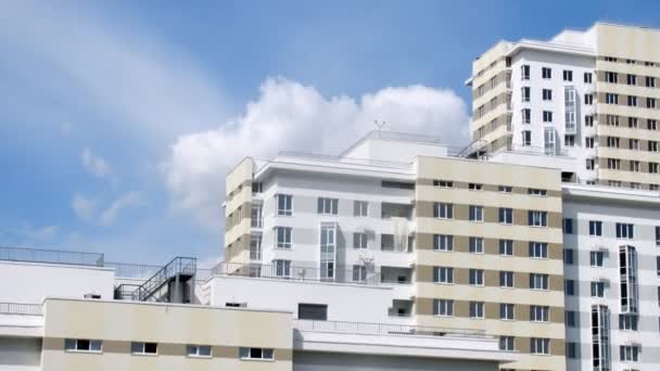 Housing estate against blue sky — Stock Video