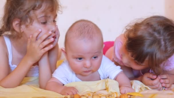 Two little girls and baby — Stock Video