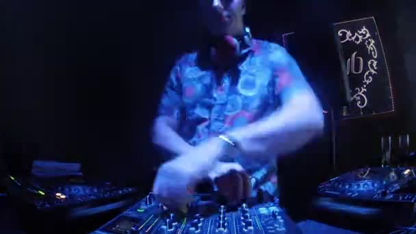 DJ mixing in club front — Stock Video