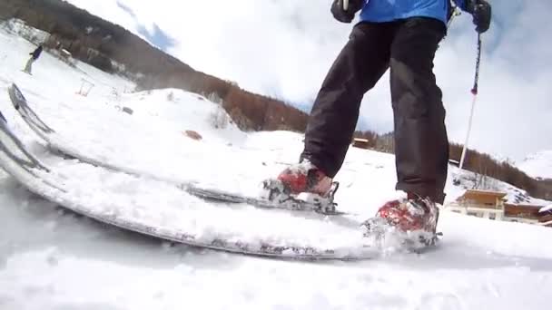 Man goes slowly on skis — Stock Video