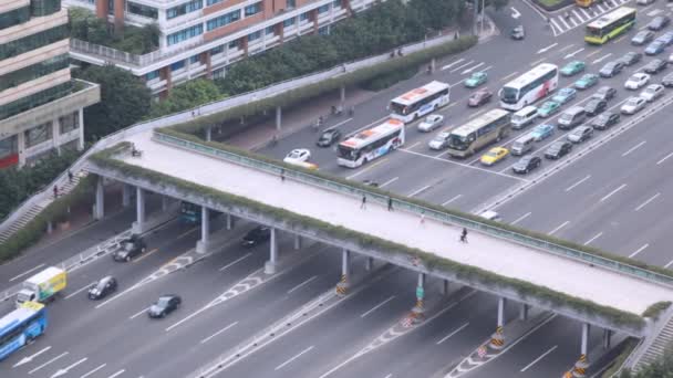 Pedestrian bridge over street — Stock Video