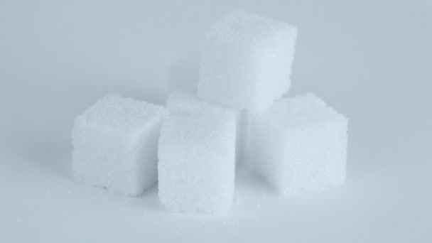 Five lump sugar cubes — Stock Video