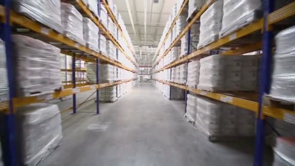 Products on shelves in warehouse — Stock Video