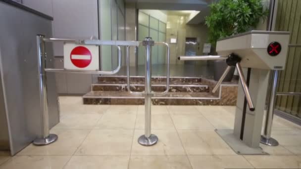 Entrance equipped with turnstile — Stock Video