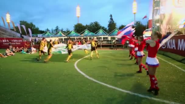 Cheerleaders dance with flags — Stock Video