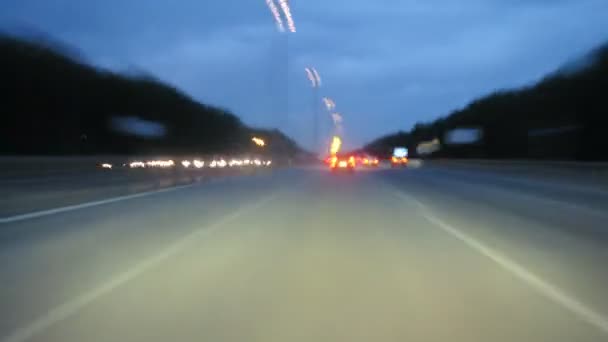 Driving at night on illuminated highway — Stock Video