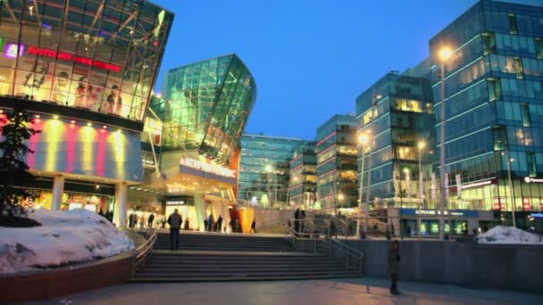 People walk near Metropolis shopping center — Stock Video