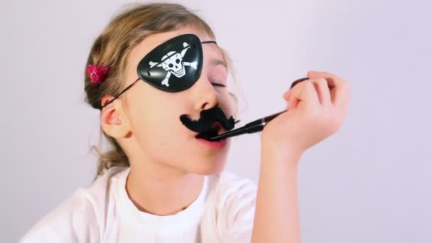 Little girl imitates pipe smoking — Stock Video