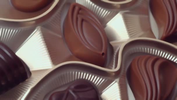 Varios dulces apetitosos de chocolate — Vídeos de Stock