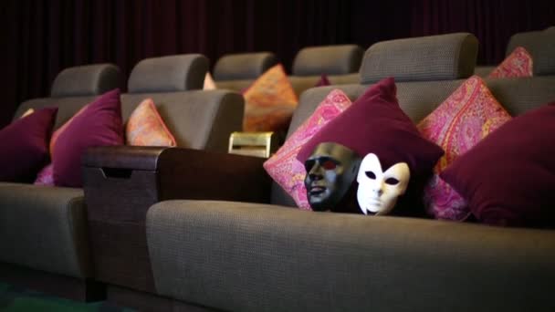 Theatrical masks in movie theater — Stock Video