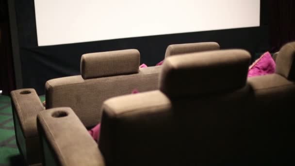 Soft sofa in cinema theatre — Stock Video