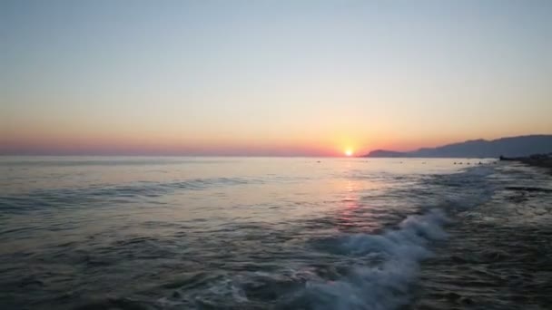 Seascape and mountains at sunset — Stock Video