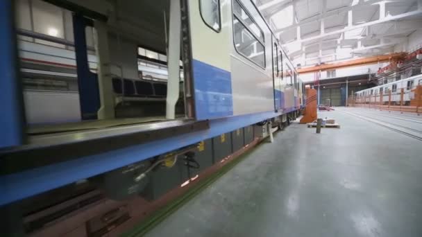 New trains at assemblage in workshop — Stock Video